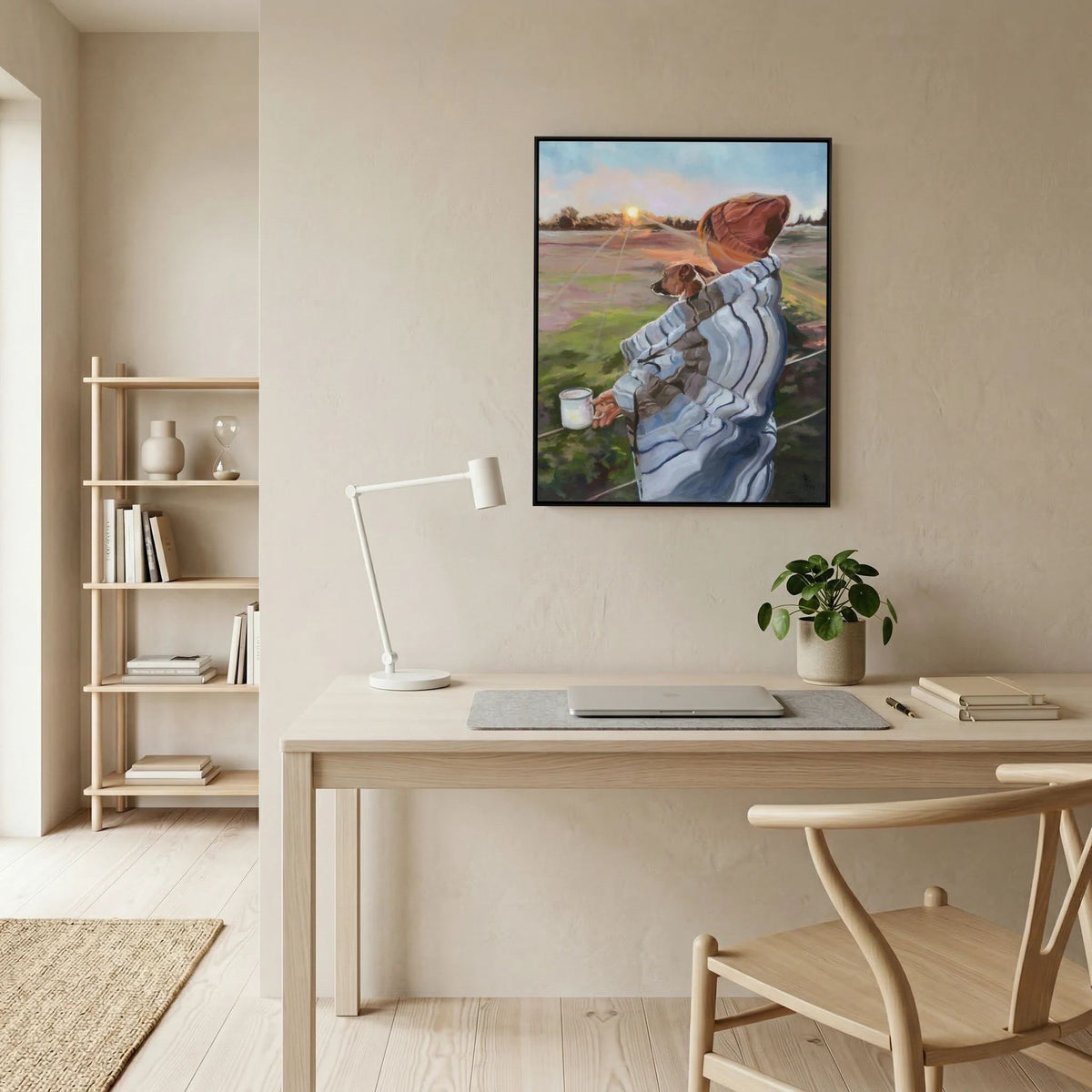 Sunrise With the Pup framed canvas print above a desk in a bright home office with shelving and a wooden chair.