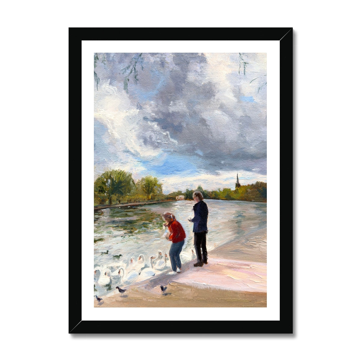 Swans in Stratford fine art print in elegant black frame, showing figures feeding swans beside the River Avon in Stratford-upon-Avon.