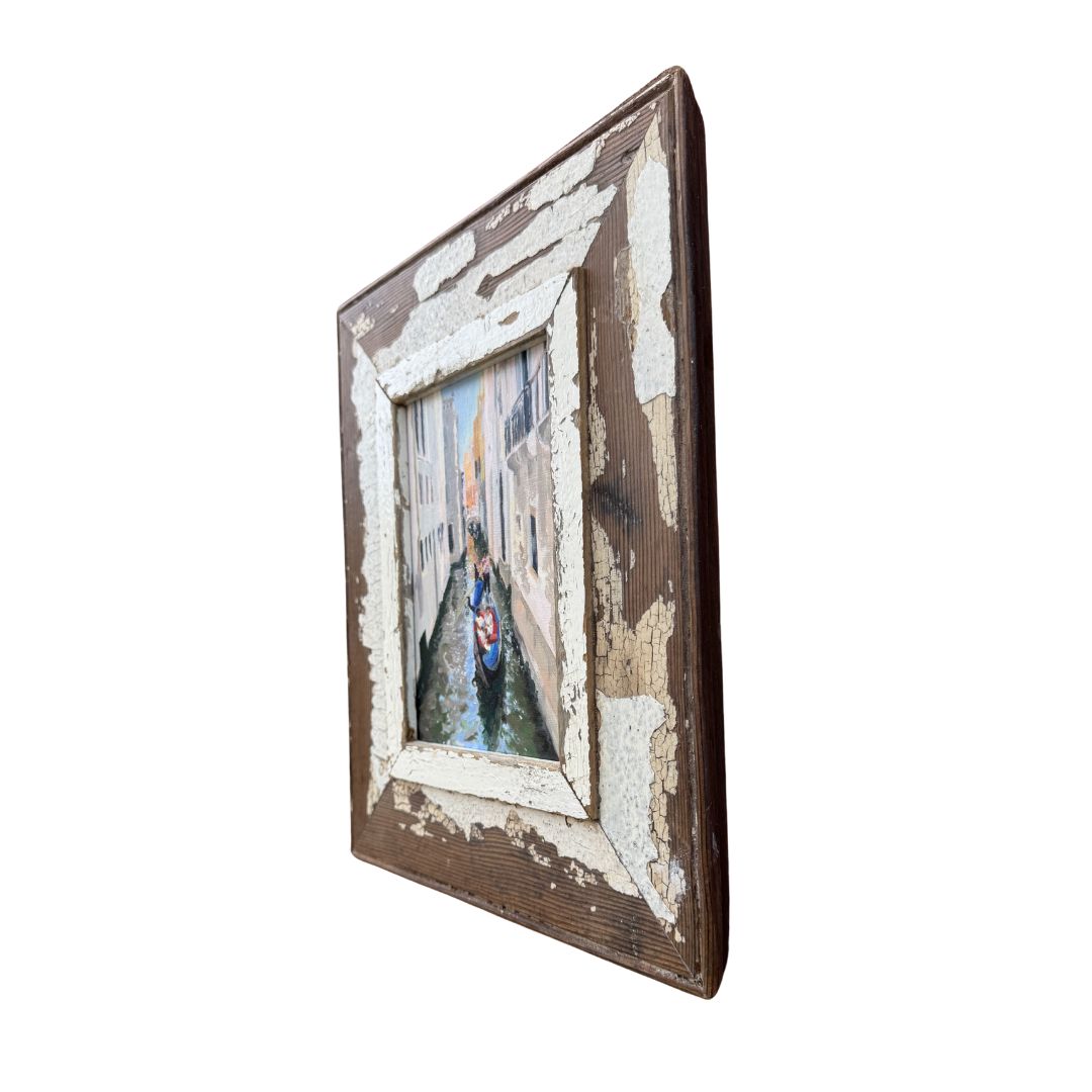 Profile view of framed Venice canal oil painting showing depth and reclaimed wood frame