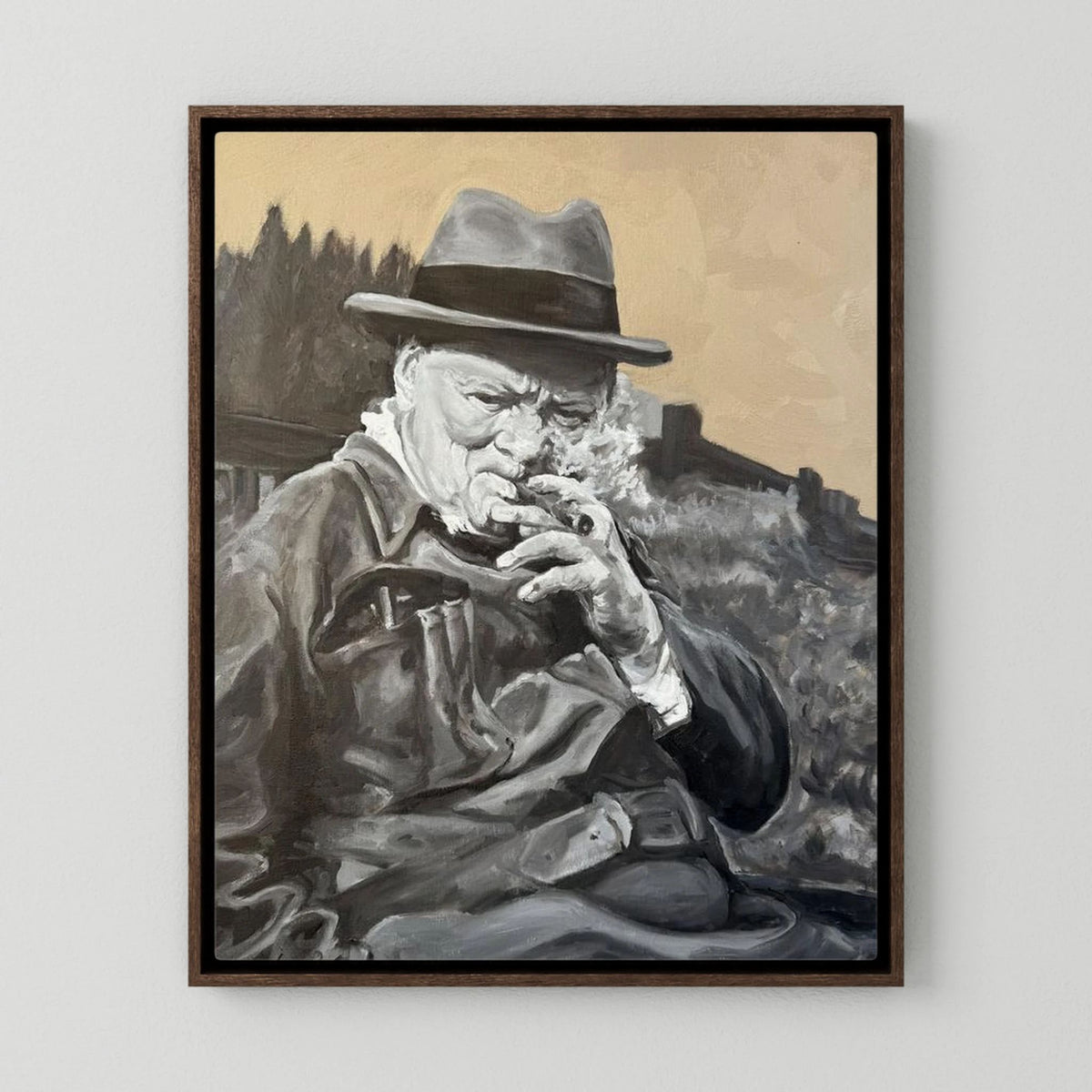 Winston Churchill portrait canvas print in a dark oak frame, with a warm beige sky behind the grey-toned figure.